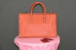 Load image into Gallery viewer, VALENTINO ORANGE ROCKSTUD SHOPPING BAG
