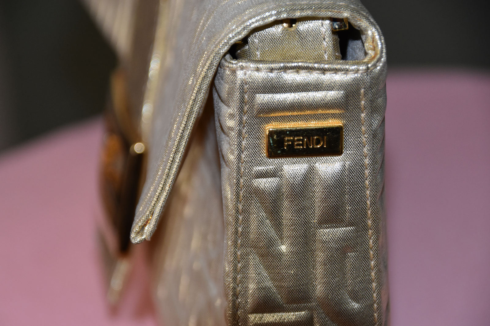 FENDI BAGUETTE BAG IN METALLIC GOLD