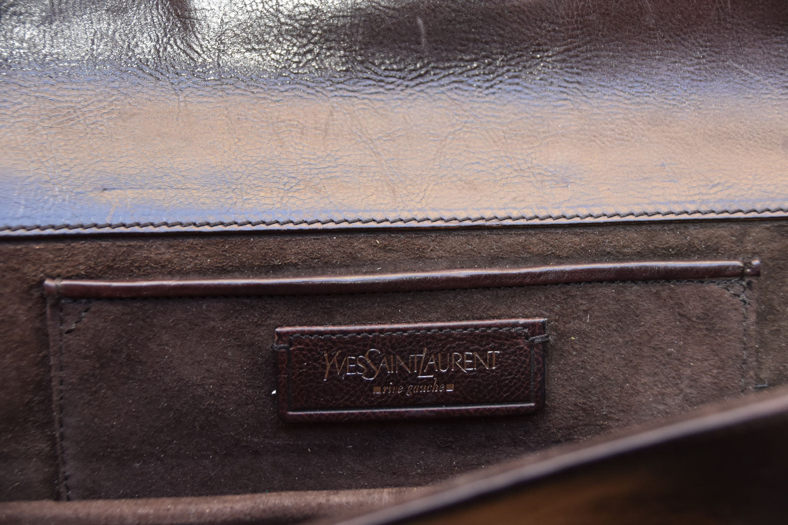 YSL BY TOM FORD PIERCED LEATHER SAFARI CLUTCH – GIZEYE YSL BY TOM FORD PIERCED LEATHER SAFARI CLUTCH – GIZEYE